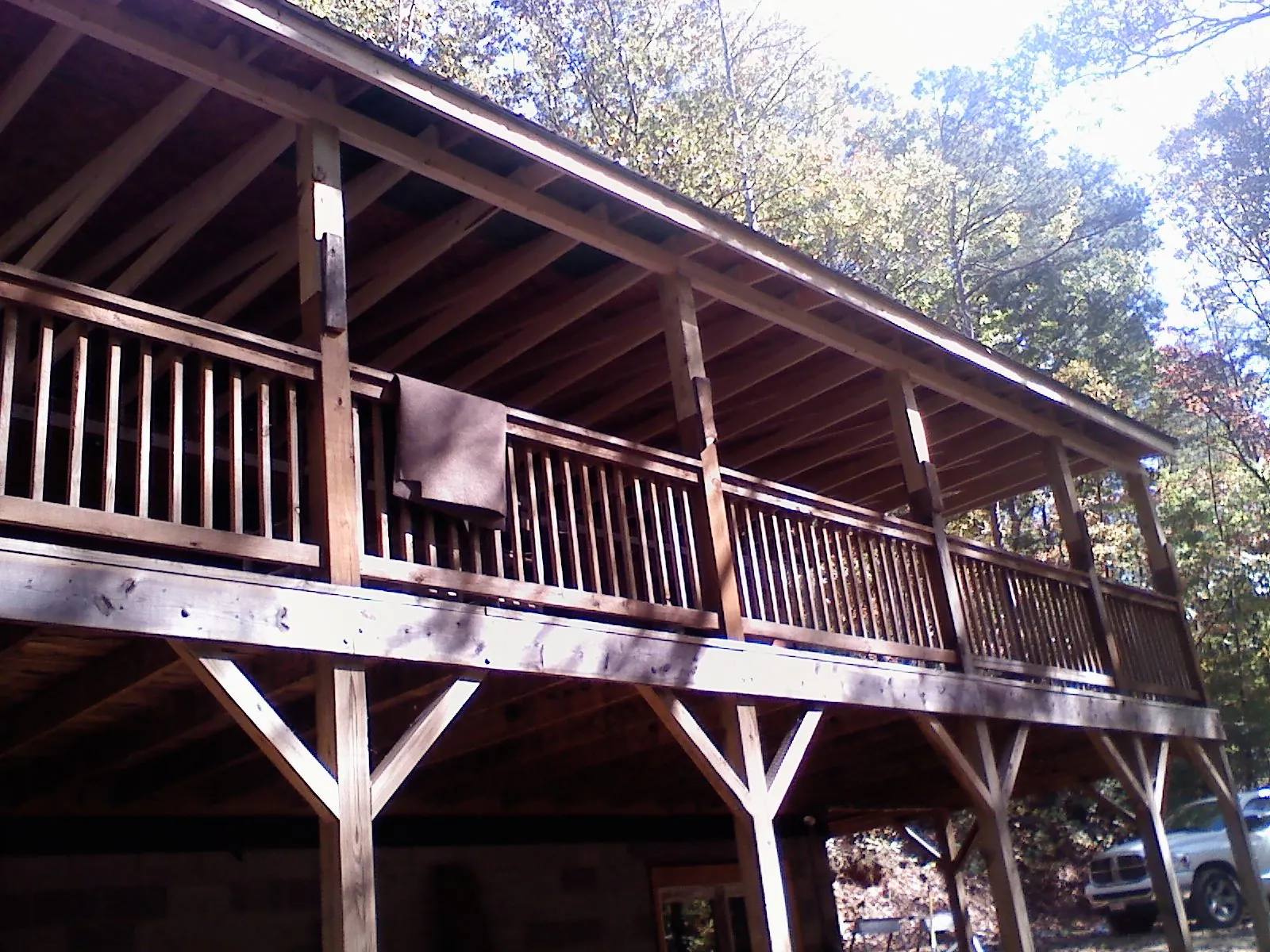 Timber framing under a new elevated porch and deck — Roof Leak Repair in Industry by Roofing Brothers